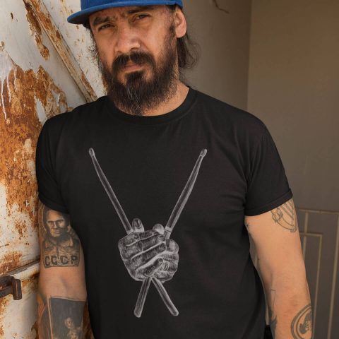 Unisex t-shirt hard drumsticks hard hands black and a bearded man leaning against a rusty wall